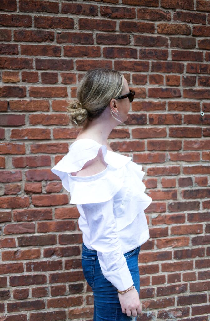 Meghan Donovan of wit & whimsy wears AG Denim and STYLEKEEPERS top