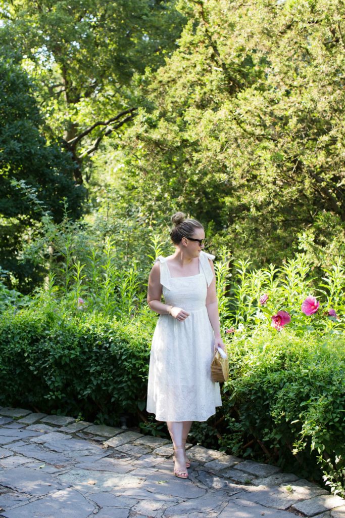 Meghan Donovan of wit & whimsy wears an eyelet dress in Central Park