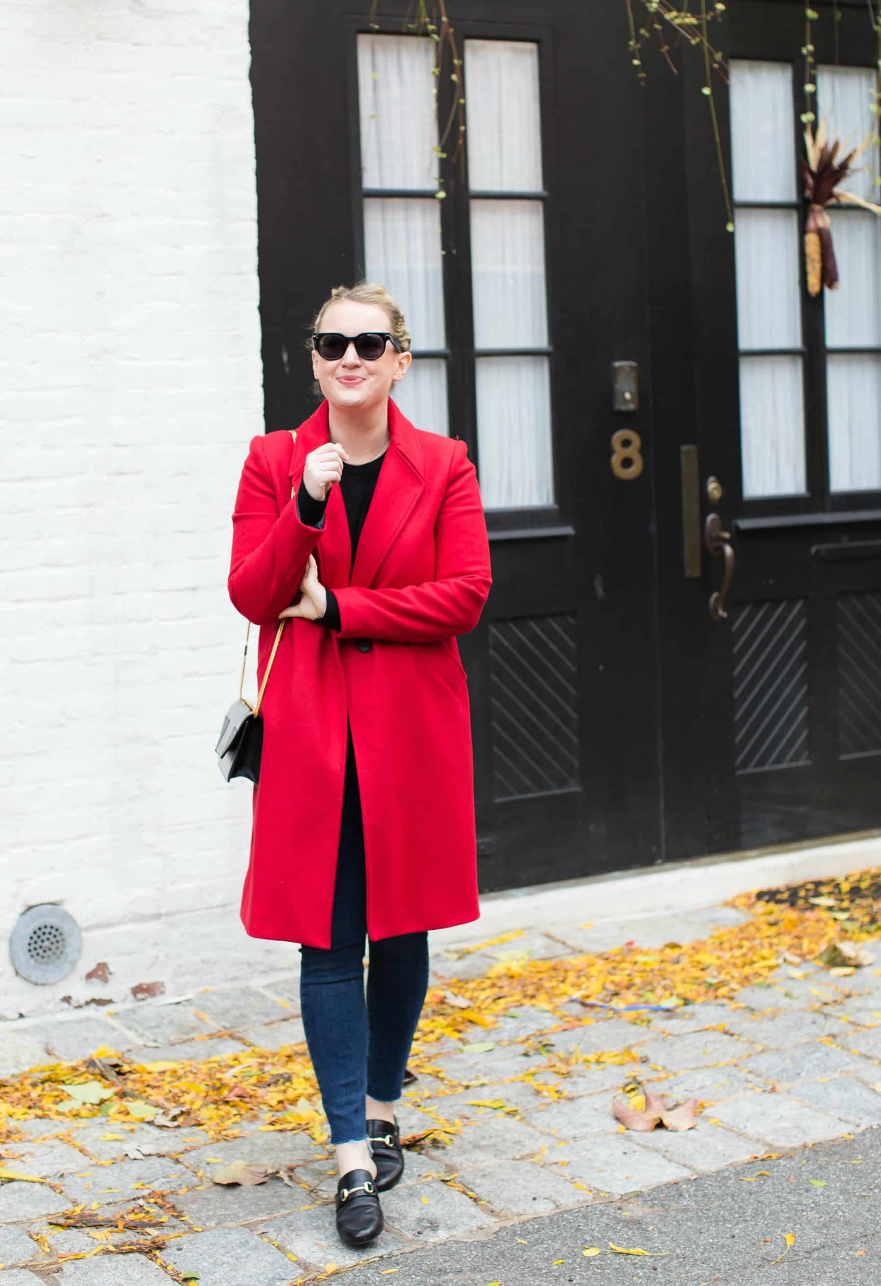 Meghan Donovan styles a red coat