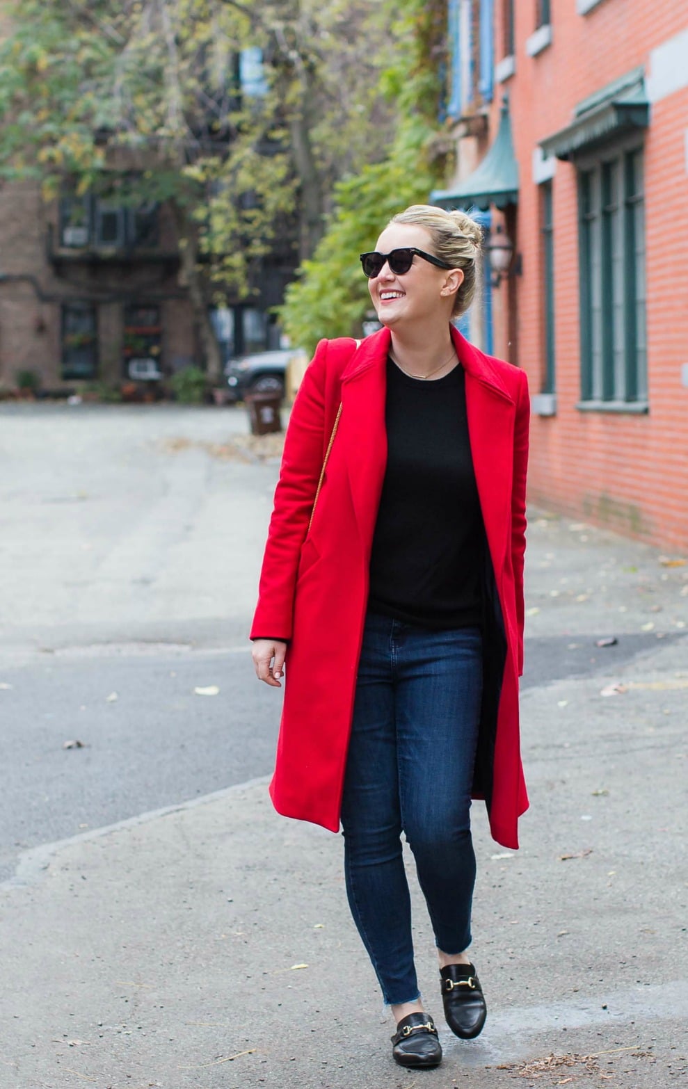 Meghan Donovan styles a red coat
