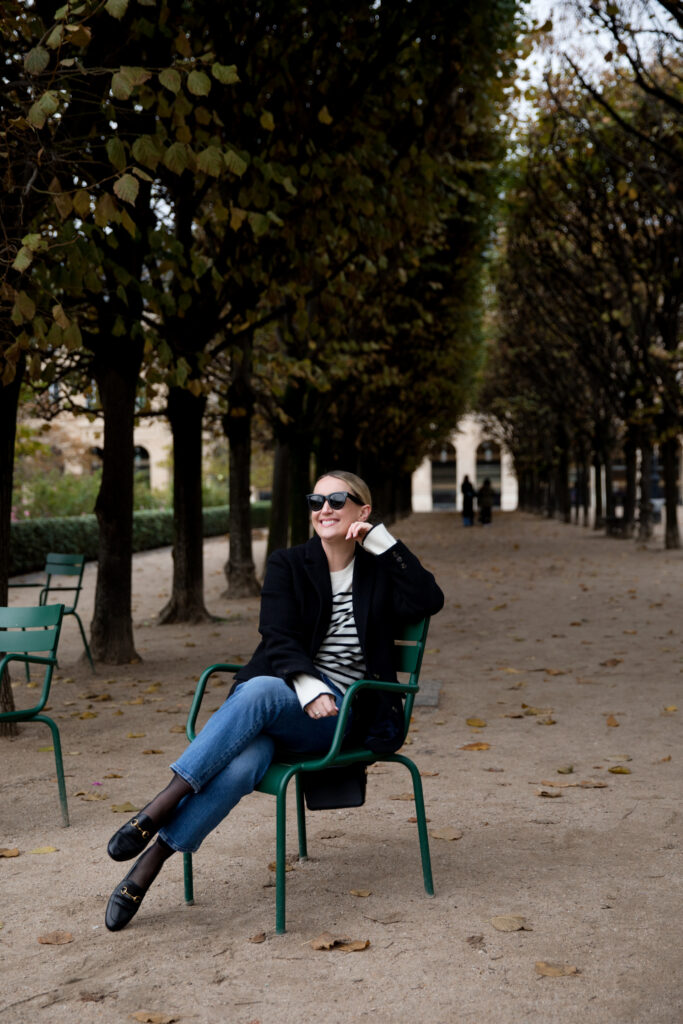 Paris Fall Outfit in the Palais Royal Gardens featuring Gucci loafers and a striped sweater by LaLigne and blazer