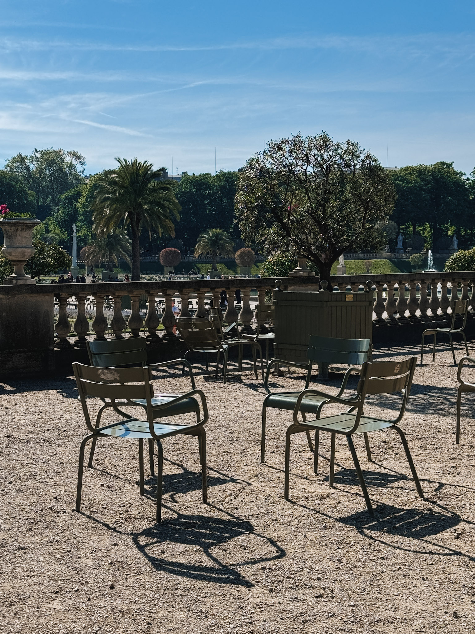 green chairs in Paris