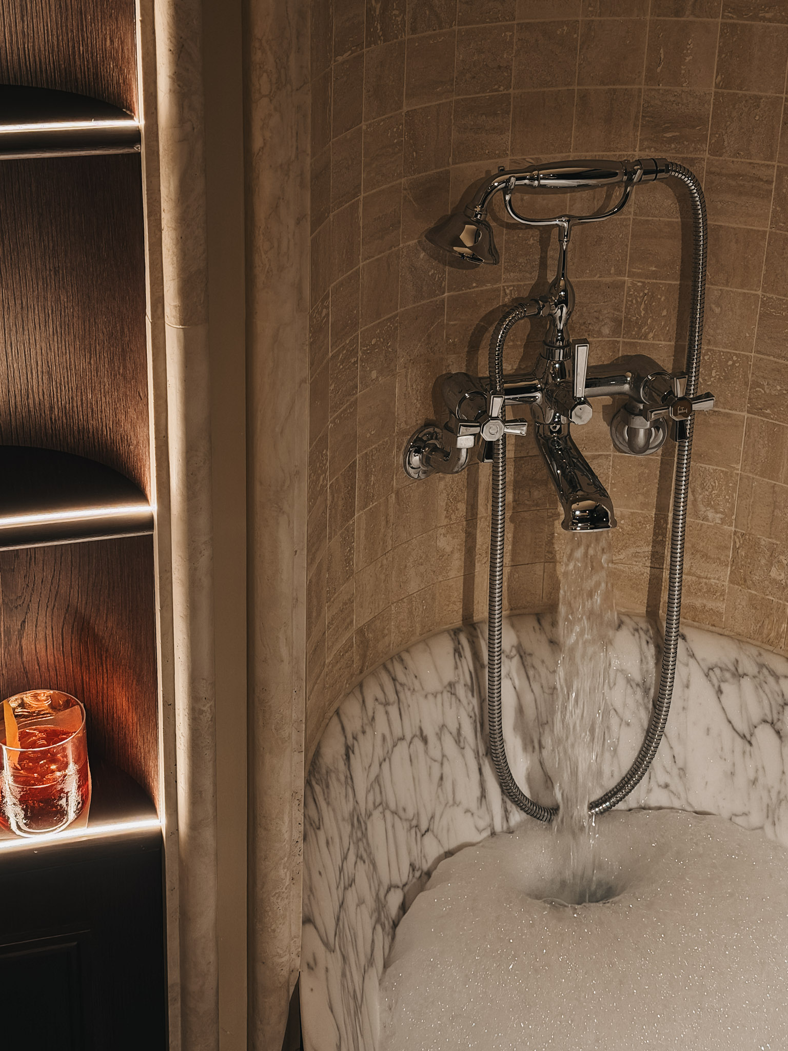 Things To Do In Paris In Winter A bath tub with bubbles in a hotel.