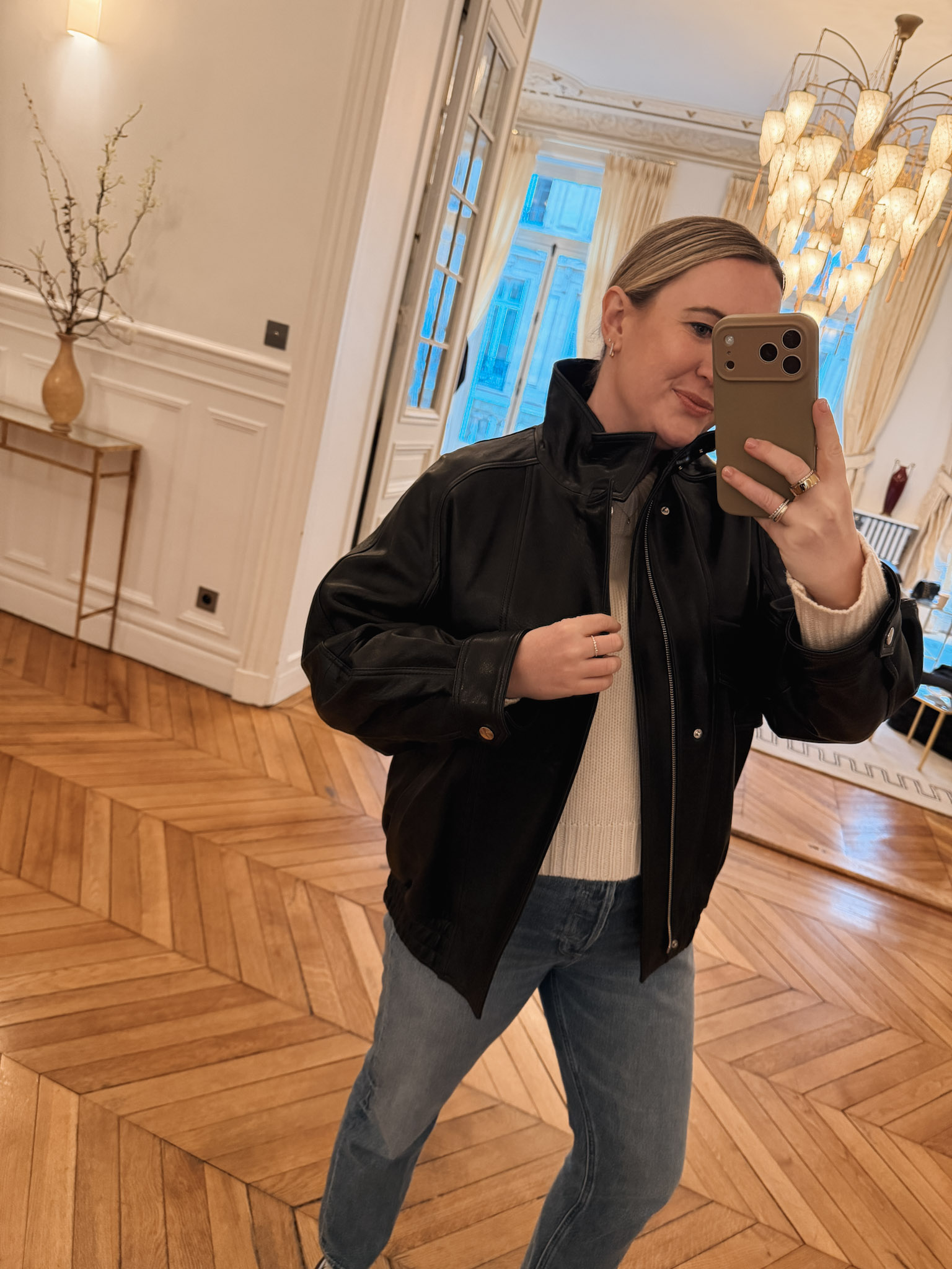 French Wardrobe Staples For Fall Nour Hammour Artiste Leather jacket